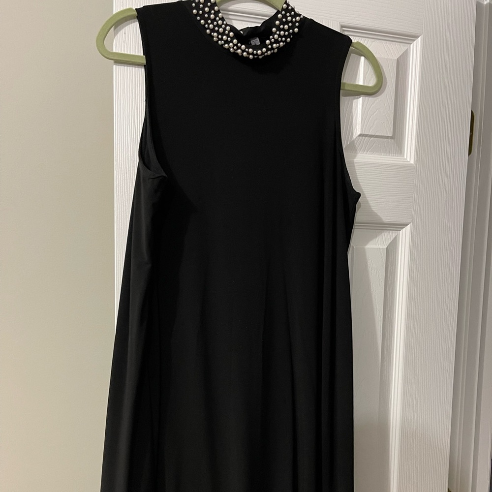 Black dress with Pearl neckline
